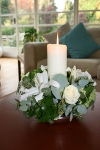 Lily and eucalyptus candle arrangement