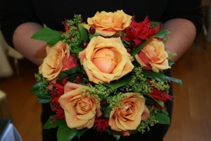 Orang roses, Alchemilla and Nareen weddinf bouquet
